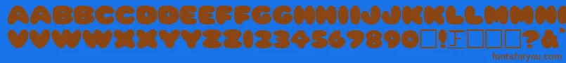 フォントPleasantlyPlump – 茶色の文字が青い背景にあります。