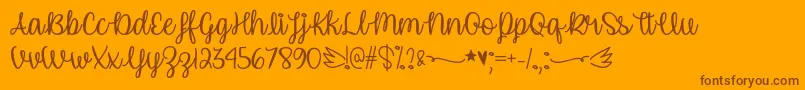 Fonte UnicornCalligraphyOtf – fontes marrons em um fundo laranja