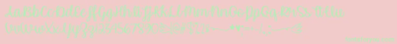 Fonte UnicornCalligraphyOtf – fontes verdes em um fundo rosa