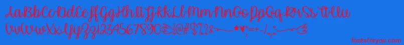 UnicornCalligraphyOtf Font – Red Fonts on Blue Background