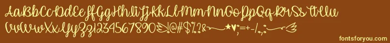 UnicornCalligraphyOtf Font – Yellow Fonts on Brown Background