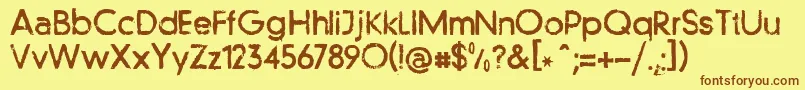 フォントLlfutur – 茶色の文字が黄色の背景にあります。