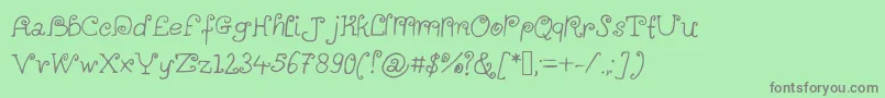 Fonte Alittlescribbleinmybook – fontes cinzas em um fundo verde