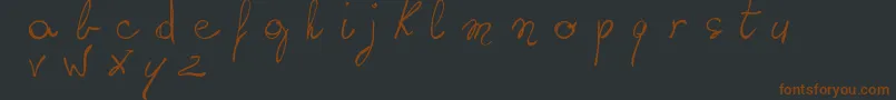 WritingSomethingByHand-fontti – ruskeat fontit mustalla taustalla