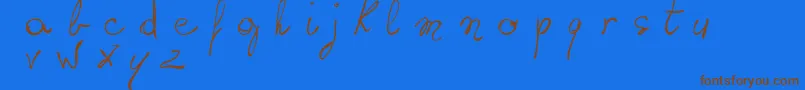 Czcionka WritingSomethingByHand – brązowe czcionki na niebieskim tle