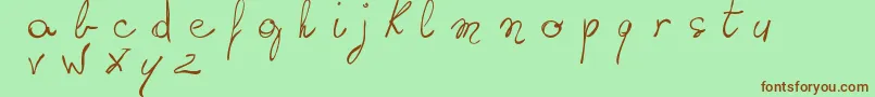 Czcionka WritingSomethingByHand – brązowe czcionki na zielonym tle
