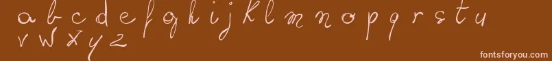 Czcionka WritingSomethingByHand – różowe czcionki na brązowym tle