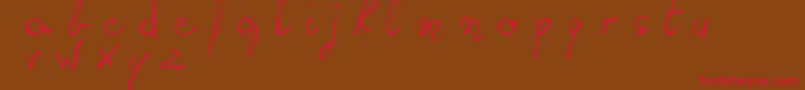 WritingSomethingByHand Font – Red Fonts on Brown Background