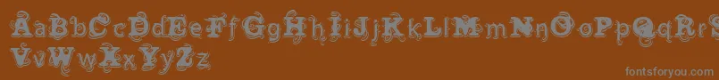 VtksWineLabel-Schriftart – Graue Schriften auf braunem Hintergrund