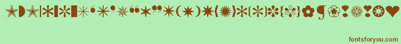 IconicSymbolsExt-Schriftart – Braune Schriften auf grünem Hintergrund