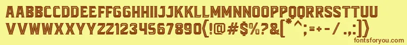 BlacktroopsInline-fontti – ruskeat fontit keltaisella taustalla