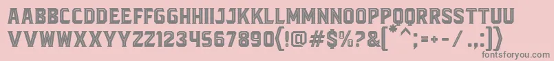 BlacktroopsInline-fontti – harmaat kirjasimet vaaleanpunaisella taustalla