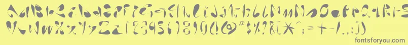 フォントLinotypearabyrafique – 黄色の背景に灰色の文字