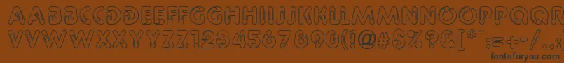 PageclipsRegular-Schriftart – Schwarze Schriften auf braunem Hintergrund