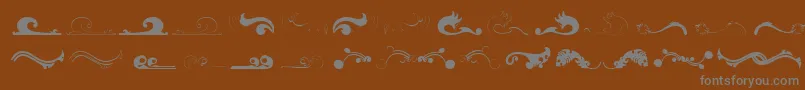 Czcionka Felicity – szare czcionki na brązowym tle