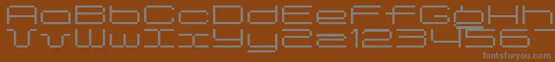Шрифт Spreadbita10 – серые шрифты на коричневом фоне