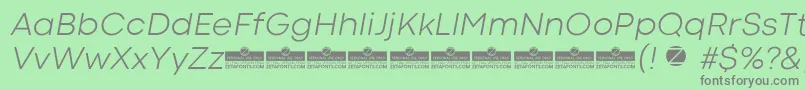 CodecColdLightItalicTrial-fontti – harmaat kirjasimet vihreällä taustalla