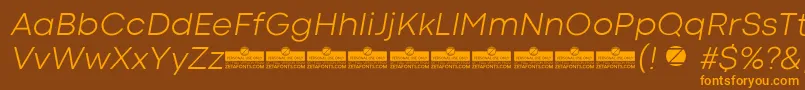 CodecColdLightItalicTrial-fontti – oranssit fontit ruskealla taustalla