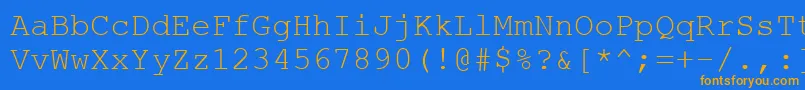 フォントCourtiercRegular – オレンジ色の文字が青い背景にあります。