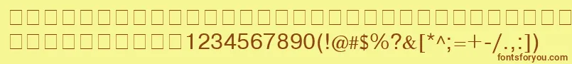 フォントCyrillichelv – 茶色の文字が黄色の背景にあります。