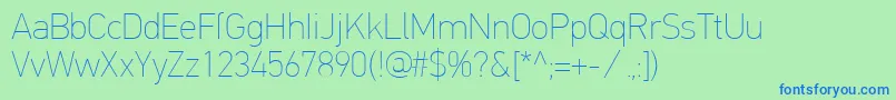 PfdintextproExtrathin Font – Blue Fonts on Green Background
