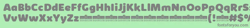 KabrioAbarthHeavyTrial Font – Gray Fonts on Green Background
