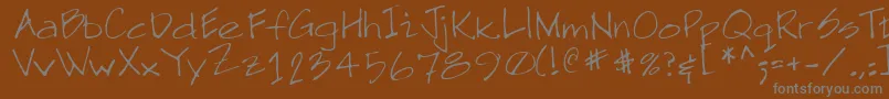 NeilRegular Font – Gray Fonts on Brown Background