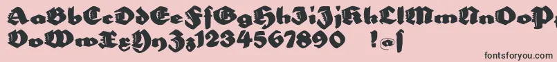Bigella-Schriftart – Schwarze Schriften auf rosa Hintergrund