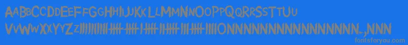 フォントWritingWithoutInk – 青い背景に灰色の文字
