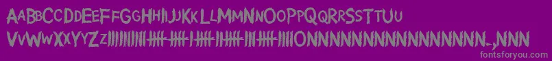 WritingWithoutInk-fontti – harmaat kirjasimet violetilla taustalla