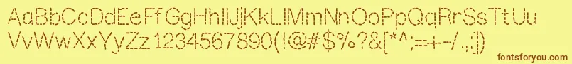 Mixstitch Font – Brown Fonts on Yellow Background