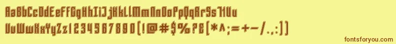 フォントSfPiezolectricInline – 茶色の文字が黄色の背景にあります。