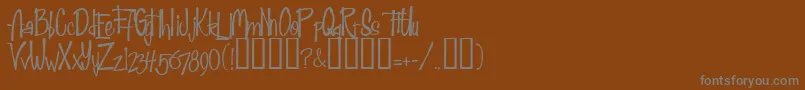 Fab50sNormal Font – Gray Fonts on Brown Background
