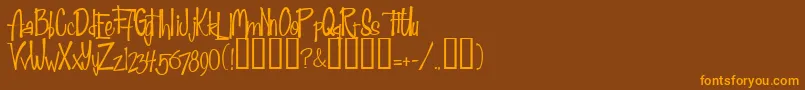 フォントFab50sNormal – オレンジ色の文字が茶色の背景にあります。