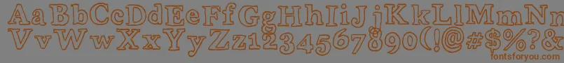 Czcionka WobblyBobOutlines – brązowe czcionki na szarym tle