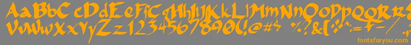 Fsoincom-Schriftart – Orangefarbene Schriften auf grauem Hintergrund