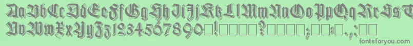 フォントKilligrewstacatto – 緑の背景に灰色の文字