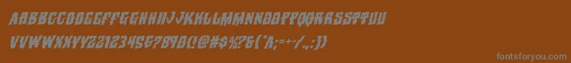 フォントWarlocksalerotatal – 茶色の背景に灰色の文字