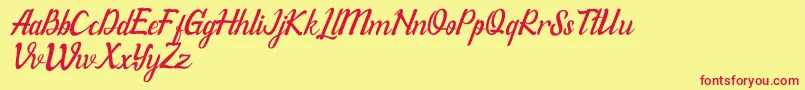 フォントWillonaItalicPu – 赤い文字の黄色い背景