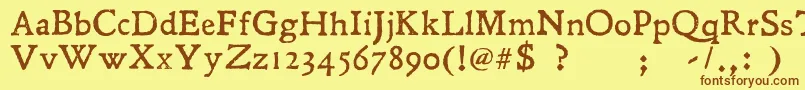 フォントLeander – 茶色の文字が黄色の背景にあります。