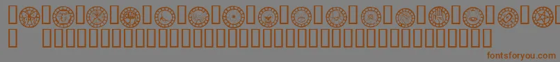 フォントWwchb ffy – 茶色の文字が灰色の背景にあります。