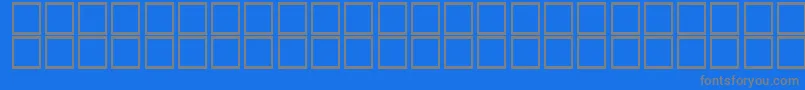 AlKharashiKoufi2-Schriftart – Graue Schriften auf blauem Hintergrund