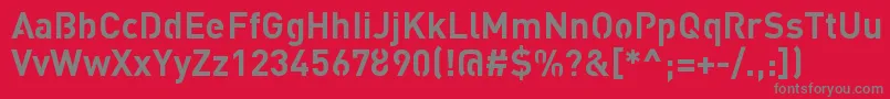 StreetvertisingBoldPublic-fontti – harmaat kirjasimet punaisella taustalla