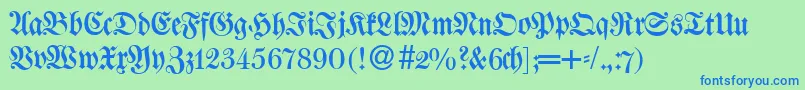 W650BlackletterRegular-Schriftart – Blaue Schriften auf grünem Hintergrund