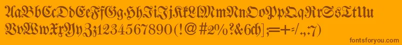W650BlackletterRegular Font – Brown Fonts on Orange Background