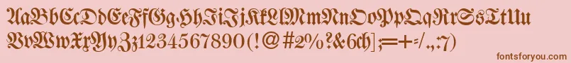 Fonte W650BlackletterRegular – fontes marrons em um fundo rosa