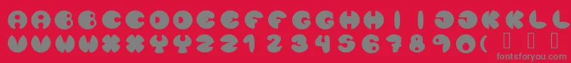 Lunanuevatype-Schriftart – Graue Schriften auf rotem Hintergrund