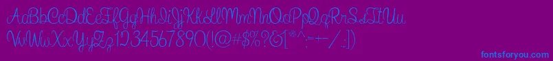 WhatIWantForChristmas-Schriftart – Blaue Schriften auf violettem Hintergrund