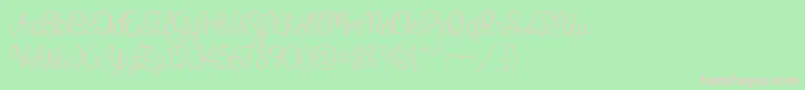 WhatIWantForChristmas-fontti – vaaleanpunaiset fontit vihreällä taustalla