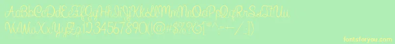 フォントWhatIWantForChristmas – 黄色の文字が緑の背景にあります